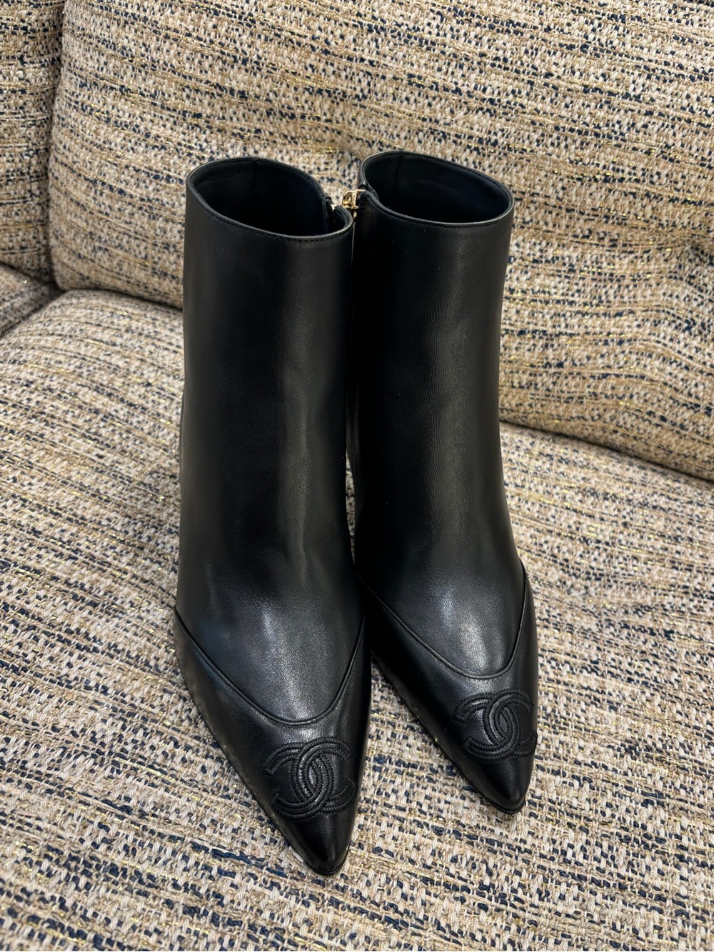CHANEL Black Leather Pointed Toe Ankle Booties with CC Stitch